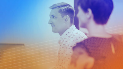 Two UX designers discussing the importance of learning science integration