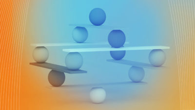 Image of multiple objects balanced evenly representing long- and short-term goals in EdTech