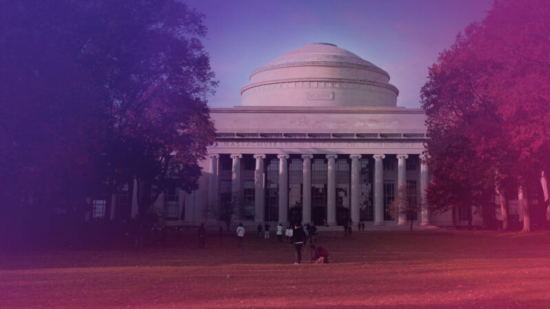 Photo of MIT campus with students in the foreground.